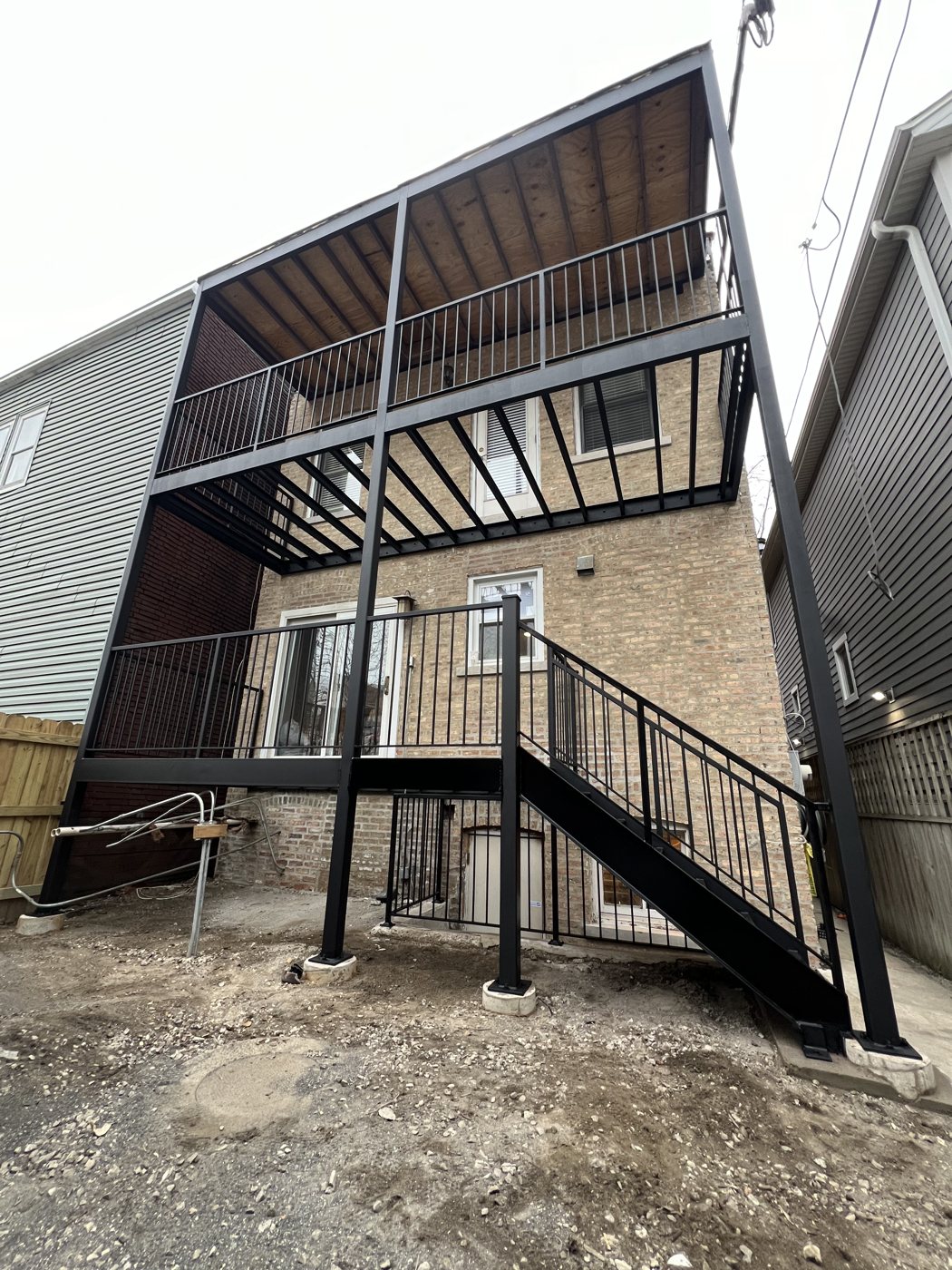 Two-story steel porch system rebuild