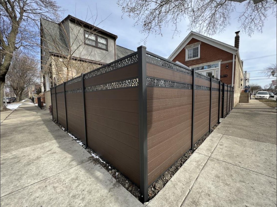 Composite privacy fence with steel detail panels